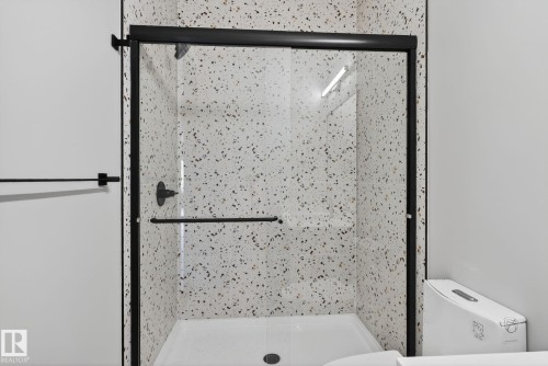 Full bathroom with a stall shower - 456 Crystal Creek Link, Leduc, AB - Indoor Photo Showing Bathroom