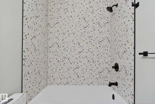 Full bath with shower / bath combination and toilet - 456 Crystal Creek Link, Leduc, AB - Indoor