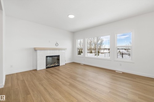 73 Sumac Close, Fort Saskatchewan, AB - Indoor Photo Showing Living Room With Fireplace