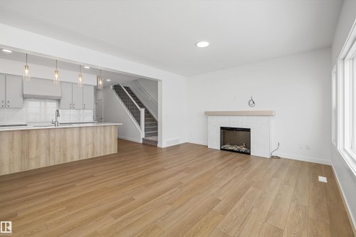 73 Sumac Close, Fort Saskatchewan, AB - Indoor Photo Showing Living Room With Fireplace