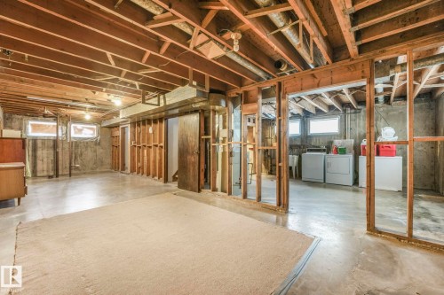 Basement with washing machine and dryer - 10324 42 Street, Edmonton, AB - Indoor Photo Showing Basement