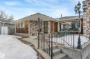 View of front of house featuring stone siding - 10324 42 Street, Edmonton, AB  - Outdoor 