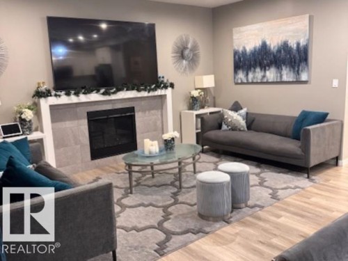 2306 Kelly Circle, Edmonton, AB - Indoor Photo Showing Living Room With Fireplace