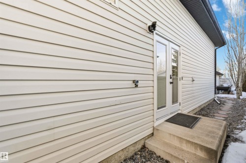 Side Entrance to property - 1706 Turvey Bend, Edmonton, AB - Outdoor With Exterior