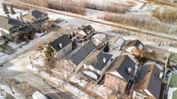 Snowy aerial view with a residential view - 