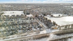 Snowy aerial view with a residential view - 