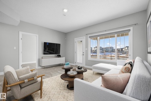 *VIRTUALLY STAGED - 1523 Darby Bay, Edmonton, AB - Indoor Photo Showing Living Room