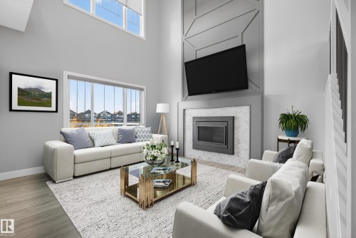 *VIRTUALLY STAGED - 1523 Darby Bay, Edmonton, AB - Indoor Photo Showing Living Room With Fireplace