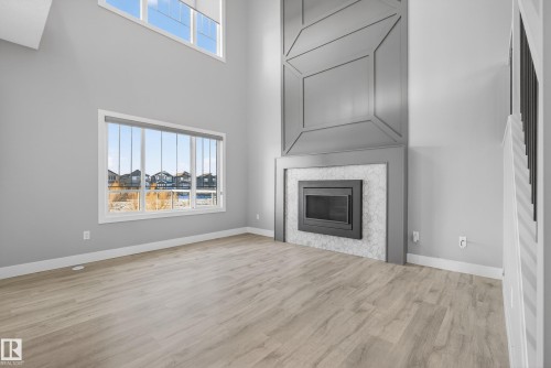 1523 Darby Bay, Edmonton, AB - Indoor Photo Showing Living Room With Fireplace