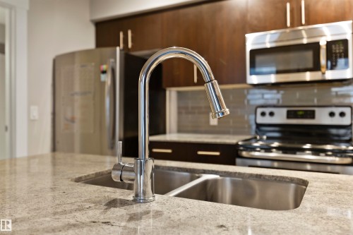 905 10226 104 Street, Edmonton, AB - Indoor Photo Showing Kitchen With Double Sink With Upgraded Kitchen