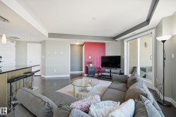 Living area with dark wood finished floors - 