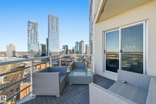 Balcony featuring outdoor seating and a skyline view - 2003 10388 105 Street, Edmonton, AB - Outdoor With Balcony