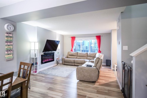 4027 3 Street Nw, Edmonton, AB - Indoor Photo Showing Living Room With Fireplace