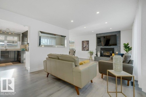 7611 141 Avenue Nw, Edmonton, AB - Indoor Photo Showing Living Room With Fireplace
