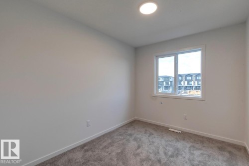 7118 50A Avenue, Beaumont, AB - Indoor Photo Showing Other Room