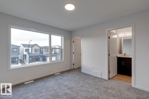 7118 50A Avenue, Beaumont, AB - Indoor Photo Showing Other Room