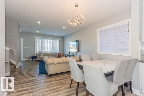 Dining area with light wood-style flooring and recessed lighting - 1224 Mcconachie Boulevard, Edmonton, AB - Indoor