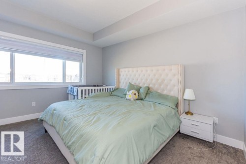 Bedroom featuring carpet floors - 1224 Mcconachie Boulevard, Edmonton, AB - Indoor Photo Showing Bedroom