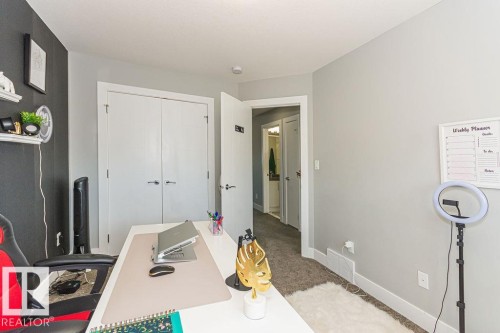 Carpeted office space with baseboards - 1224 Mcconachie Boulevard, Edmonton, AB - Indoor