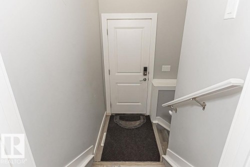 Doorway to outside with baseboards - 1224 Mcconachie Boulevard, Edmonton, AB - Indoor Photo Showing Other Room