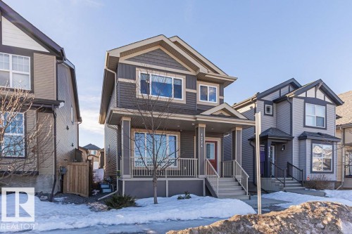 View of front facade featuring a porch - 1224 Mcconachie Boulevard, Edmonton, AB - Outdoor With Facade