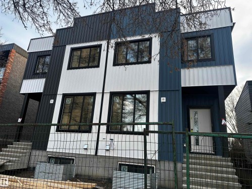 View of property exterior with a metal roof - 10021 89 Avenue, Edmonton, AB - Outdoor
