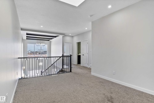 Carpeted spare room with recessed lighting and a textured ceiling - 112 25 Street, Edmonton, AB - Indoor Photo Showing Other Room