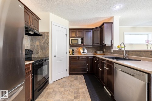 228 Hyndman Crescent, Edmonton, AB - Indoor Photo Showing Kitchen With Stainless Steel Kitchen With Double Sink