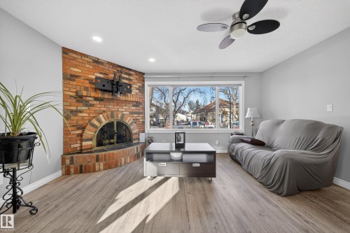 9521 109 Avenue, Edmonton, AB - Indoor Photo Showing Living Room With Fireplace