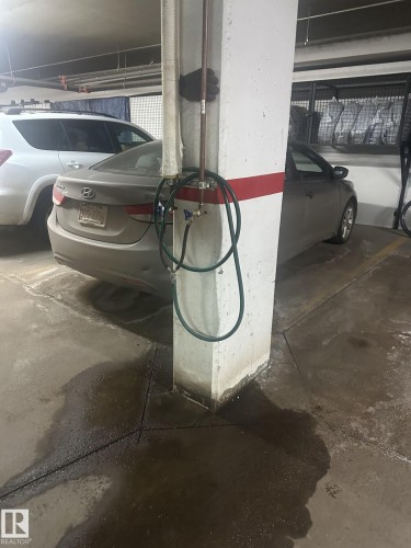 Hot/cold water for car wash in underground parking - 209 10116 80 Avenue, Edmonton, AB - Indoor Photo Showing Garage
