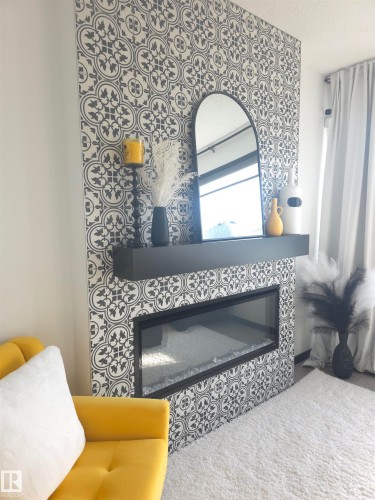 7015 52 Avenue, Beaumont, AB - Indoor Photo Showing Living Room With Fireplace