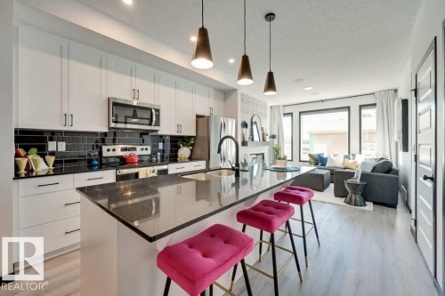 7015 52 Avenue, Beaumont, AB - Indoor Photo Showing Kitchen With Upgraded Kitchen