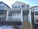 7015 52 Avenue, Beaumont, AB  - Outdoor With Deck Patio Veranda With Facade 