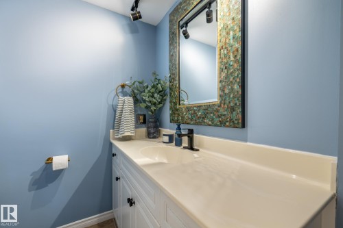 Bathroom with vanity and baseboards - 1502 9909 110 Street, Edmonton, AB - Indoor Photo Showing Bathroom