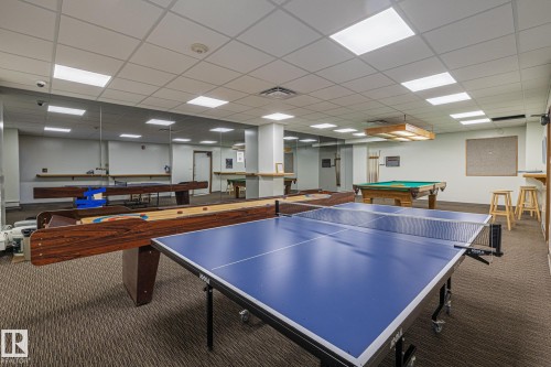 Game room with a drop ceiling and billiards table - 1502 9909 110 Street, Edmonton, AB - Indoor Photo Showing Other Room