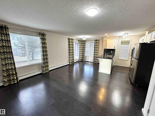 117 5521 7 Avenue, Edmonton, AB - Indoor Photo Showing Living Room