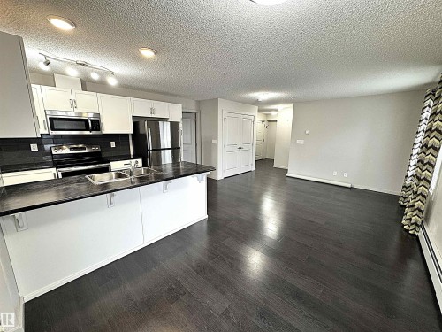 117 5521 7 Avenue, Edmonton, AB - Indoor Photo Showing Kitchen With Double Sink