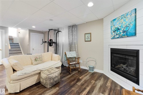 1717 Kensit Place, Edmonton, AB - Indoor Photo Showing Living Room With Fireplace