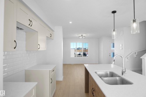 20935 16 Avenue, Edmonton, AB - Indoor Photo Showing Kitchen With Double Sink
