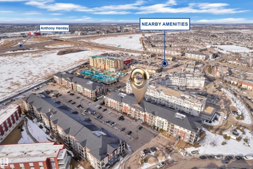 Aerial overview of property's location featuring nearby urban area - 216 5804 Mullen Place, Edmonton, AB - Outdoor With View