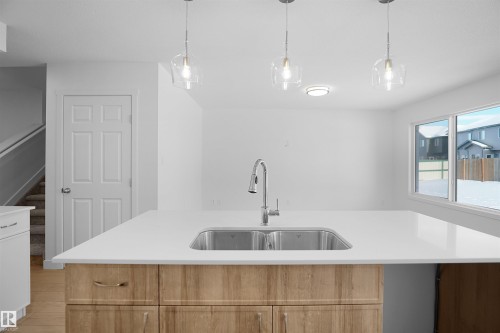 930 15 Avenue, Edmonton, AB - Indoor Photo Showing Kitchen With Double Sink