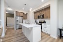 73 Garneau Gate, Spruce Grove, AB  - Indoor Photo Showing Kitchen With Double Sink With Upgraded Kitchen 