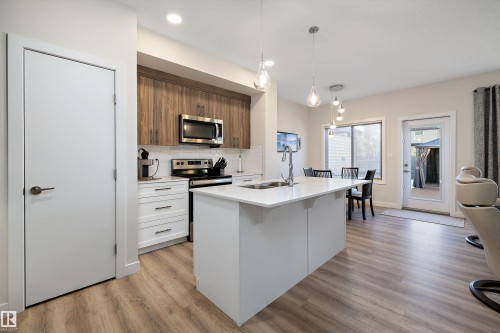 73 Garneau Gate, Spruce Grove, AB - Indoor Photo Showing Kitchen With Double Sink