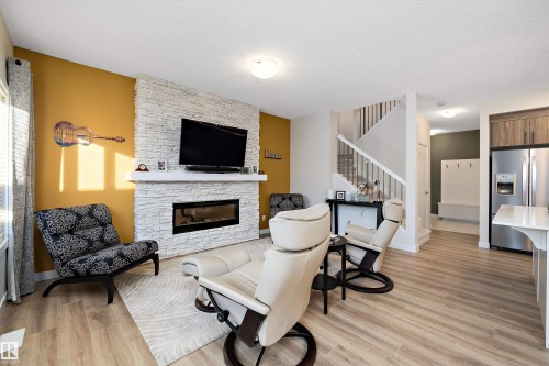73 Garneau Gate, Spruce Grove, AB - Indoor Photo Showing Living Room With Fireplace