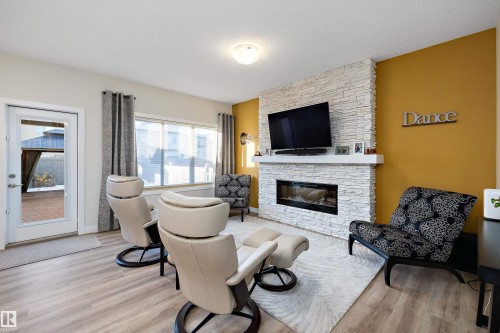 73 Garneau Gate, Spruce Grove, AB - Indoor Photo Showing Living Room With Fireplace