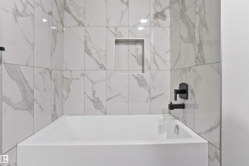 Full bathroom featuring shower / bathtub combination - 116 25 Street, Edmonton, AB - Indoor Photo Showing Bathroom