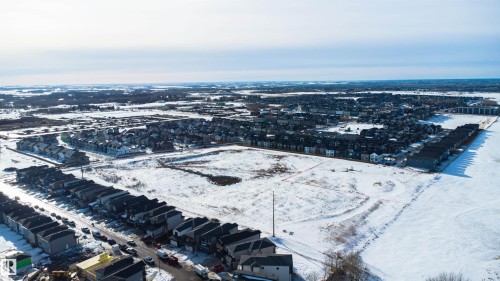 Snowy aerial view with a residential view - 116 25 Street, Edmonton, AB - Outdoor With View