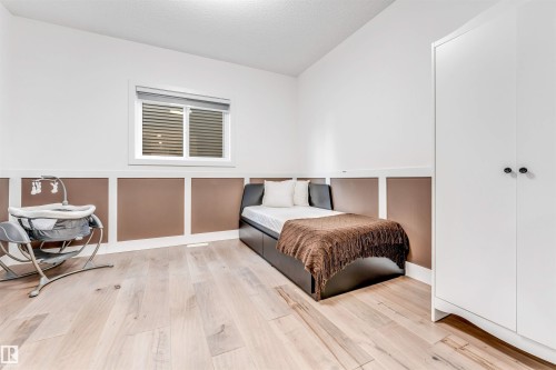 Bedroom with light wood finished floors - 1407 Graydon Hill Way, Edmonton, AB - Indoor Photo Showing Bedroom