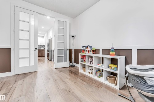 Game room featuring light wood finished floors and recessed lighting - 1407 Graydon Hill Way, Edmonton, AB - Indoor