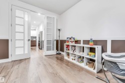 Game room featuring light wood finished floors and recessed lighting - 